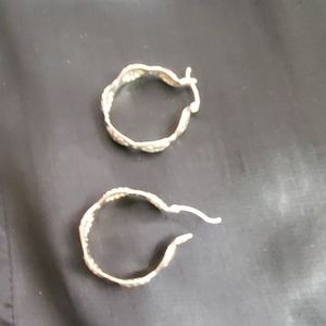 Silver concho shaped earrings